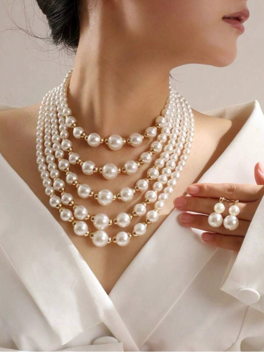 Elegant Multi-Strand White Pearl Necklace with Matching Earrings